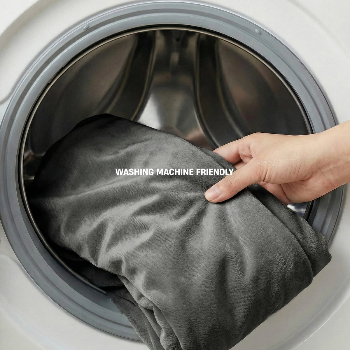 Charcoal replacement cover being removed for machine washing.