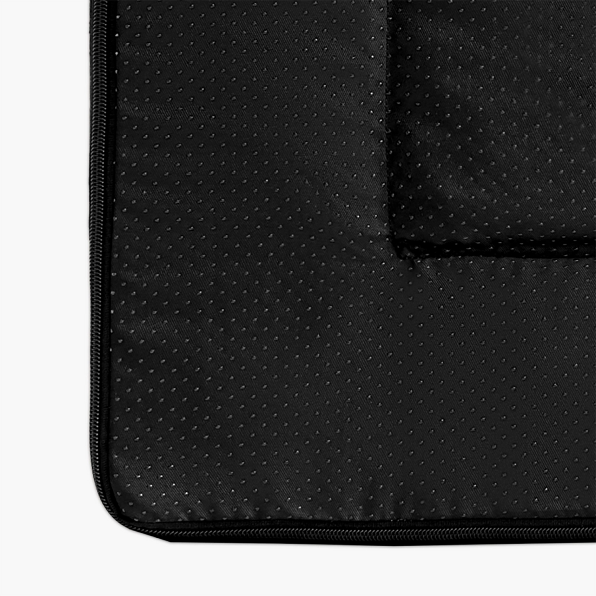Close-up of the black textured inner lining and zipper of the grey replacement cover.